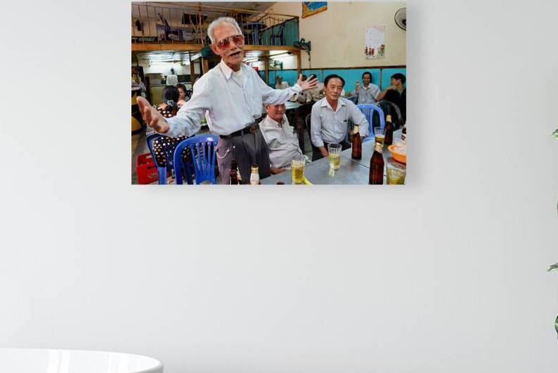 Men gather in Ho Chi Minh Vietnam for drinks and conversation by Marco Brivio