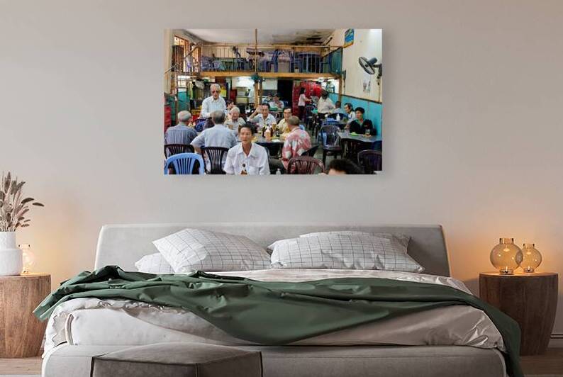 People gather in cafe in Ho Chi Minh City with drinks and food by Marco Brivio