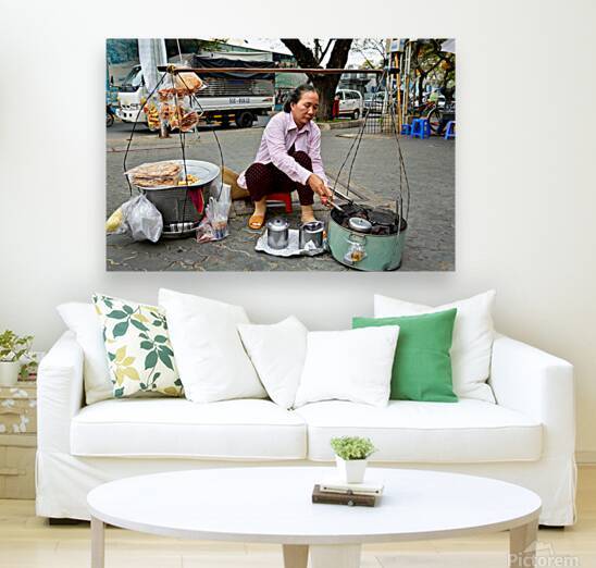 Local vendor preparing street food in Ho Chi Minh City Vietnam by Marco Brivio