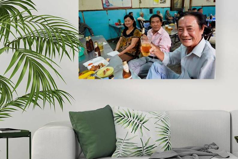 People enjoying time together in a cafe in Ho Chi Minh City by Marco Brivio