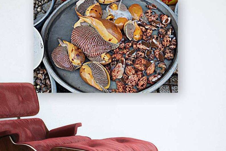 Seafood market in Phu Quoc with shells and clams for sale by Marco Brivio