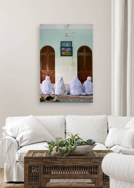 Muslim women pray in a room in Ho Chi Minh City by Marco Brivio