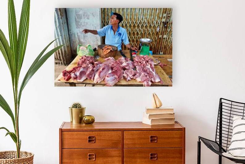 Local butcher selling meat in Phu Quoc market area by Marco Brivio