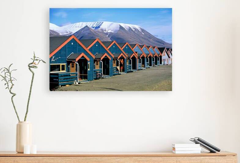 Colorful houses line the street in Longyearbyen Svalbard by Marco Brivio