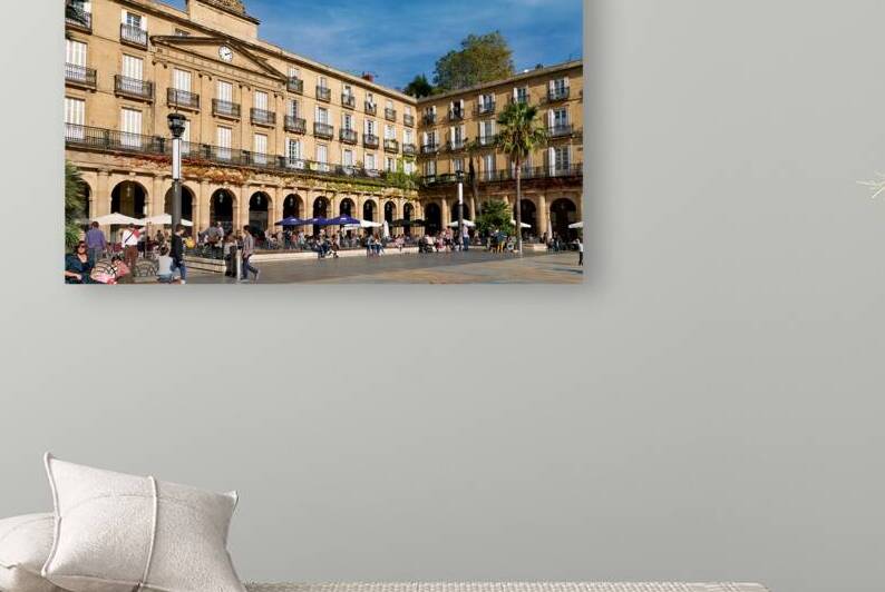 Exploring Plaza Nueva in Bilbao Spain on a sunny day by Marco Brivio