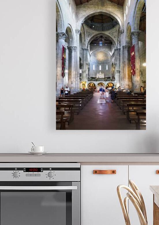 Visitors explore Santa Maria della Pieve in Arezzo Italy by Marco Brivio