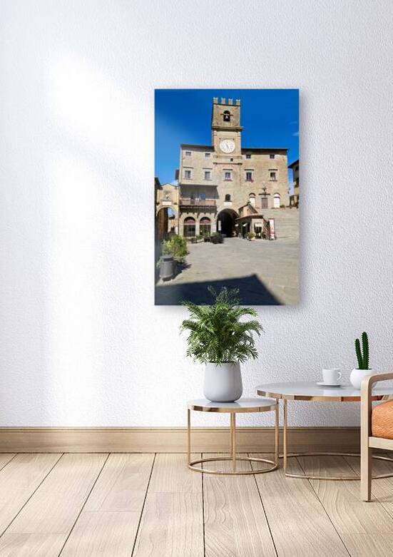 People visit Piazza della Repubblica in Cortona during sunny day by Marco Brivio