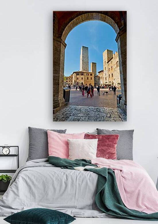 Visitors gather in San Gimignanos Piazza del Duomo in Tuscany by Marco Brivio