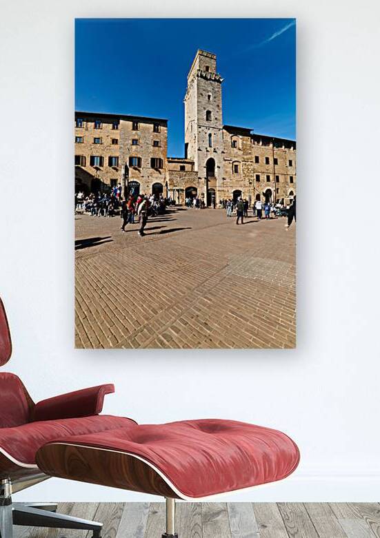 Visitors gather in San Gimignano at Piazza della Cisterna by Marco Brivio
