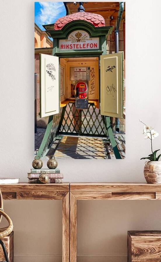 Old telephone booth stands in Stockholm Sweden by Marco Brivio