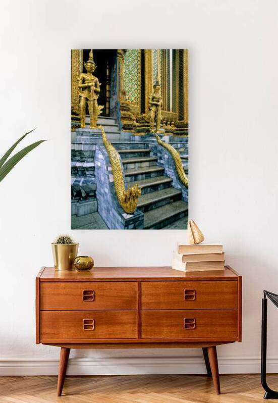 Gilded statues guard Wat Phra Kaew in Bangkok by Marco Brivio