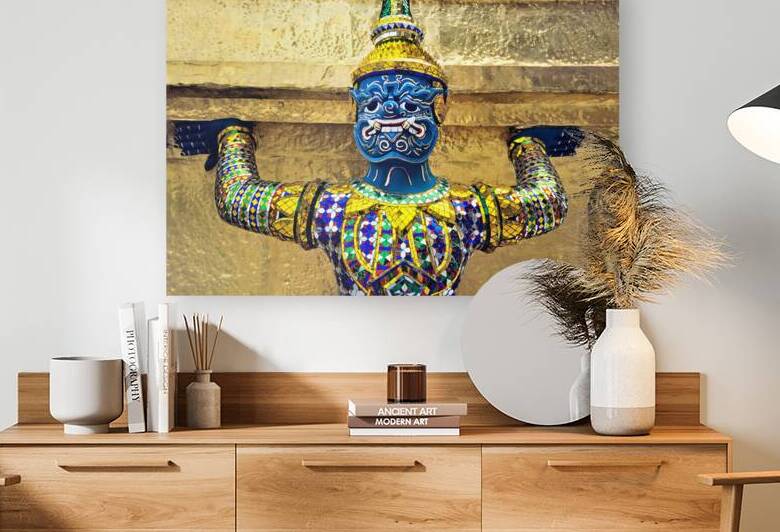 Statue at Wat Phra Kaew in Bangkok holds up structure by Marco Brivio