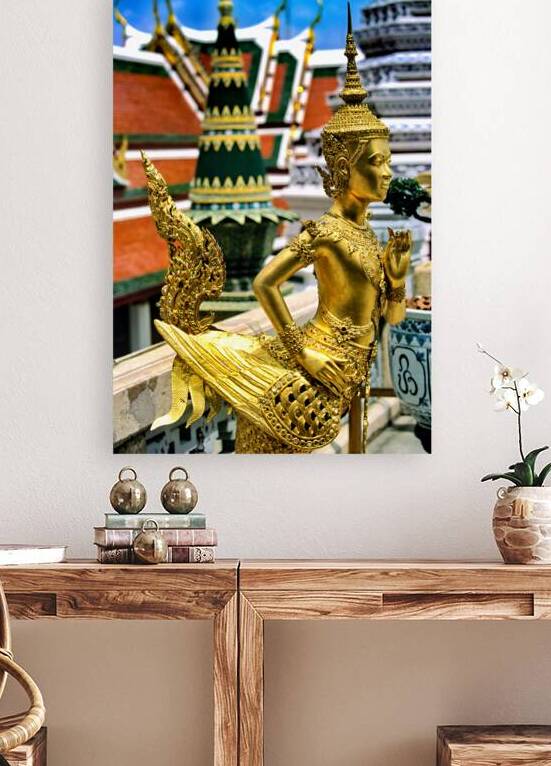 Golden statue at Wat Phra Kaew in Bangkok by Marco Brivio