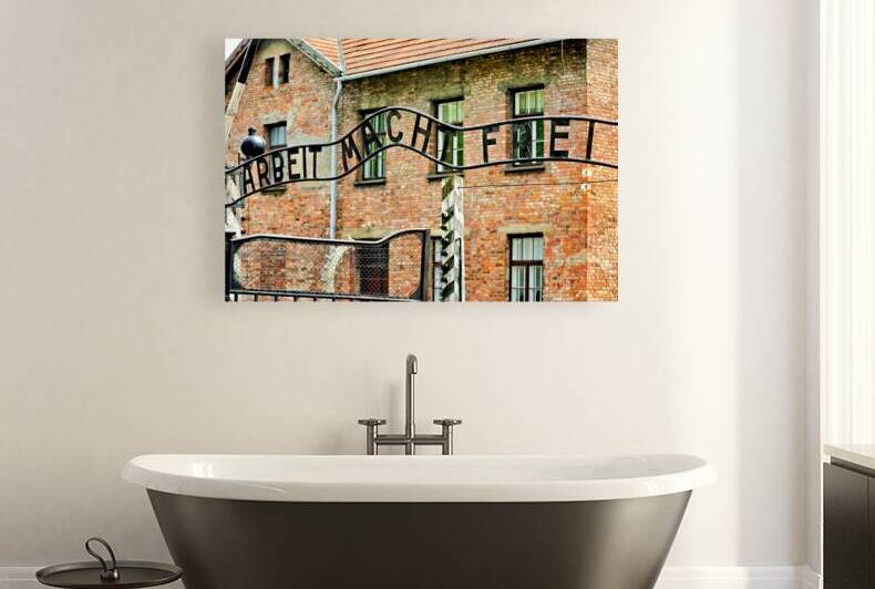 Entry gate of Auschwitz concentration camp in Krakow Poland by Marco Brivio