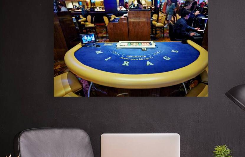 Roulette table activity at Caesars Palace in Las Vegas by Marco Brivio