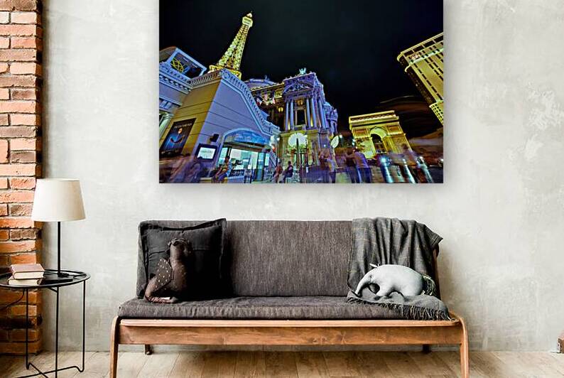 Las Vegas Strip at night with bright lights and crowds by Marco Brivio