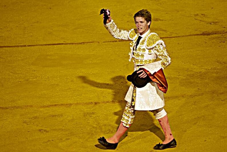 Bullfighter stands in Seville Arena after the fight by Marco Brivio