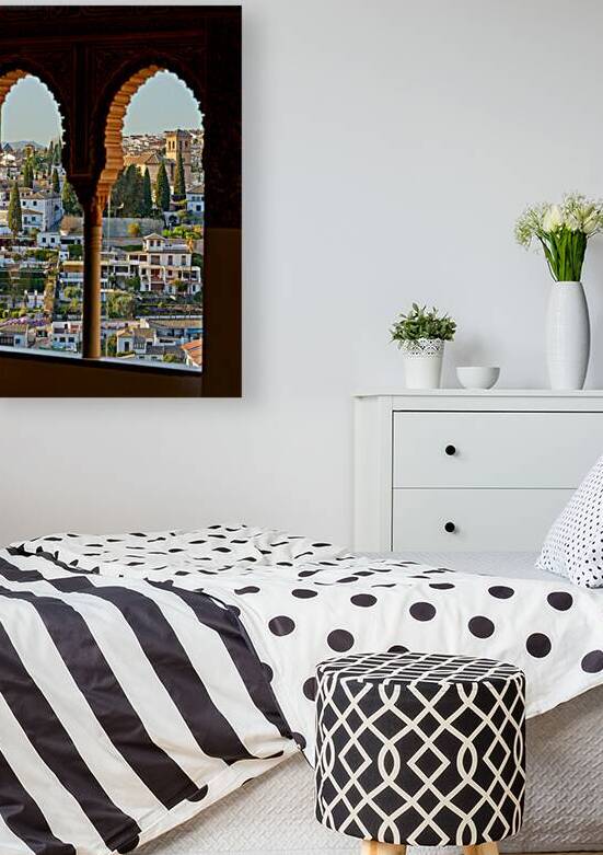 View of Granada cityscape through arches in Andalusia by Marco Brivio