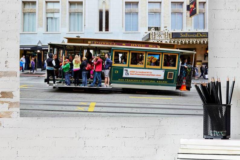 Cablecar travels through streets of San Francisco by Marco Brivio