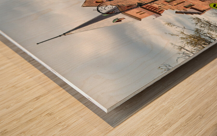 Historic brick building with a tower and people walking. Wood print