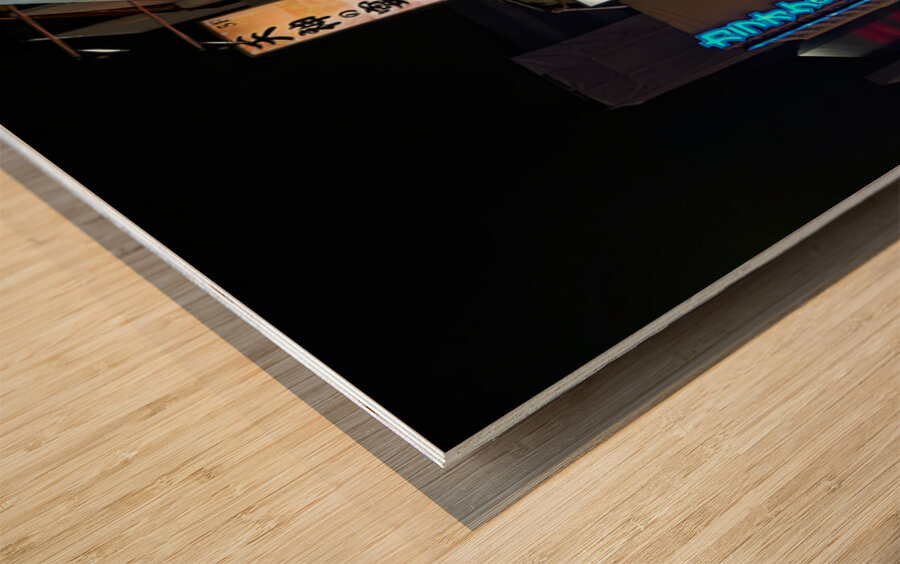 Neon lights illuminate Shinjuku district streets in Tokyo at nig Wood print