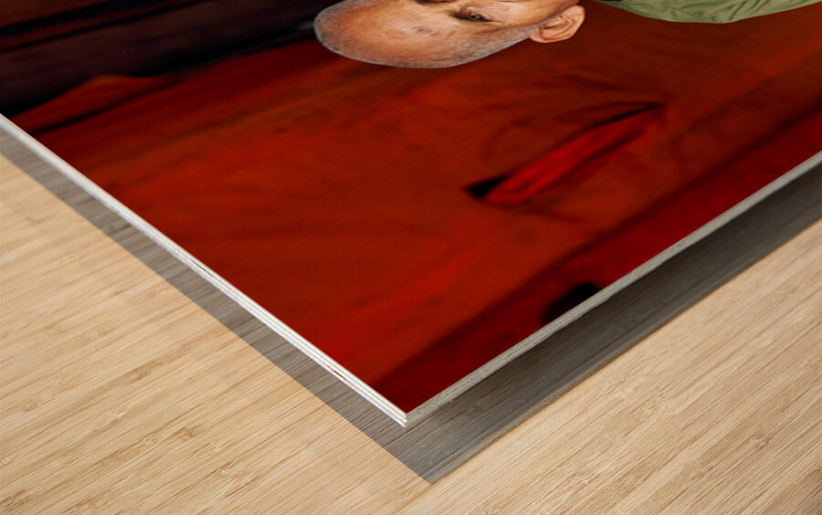 Elderly person in traditional clothing sitting calmly. Wood print