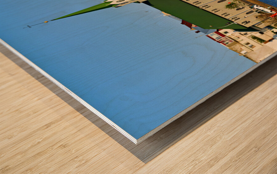 Lutheran Free Church near Lake Tjornin in Reykjavik Iceland Wood print