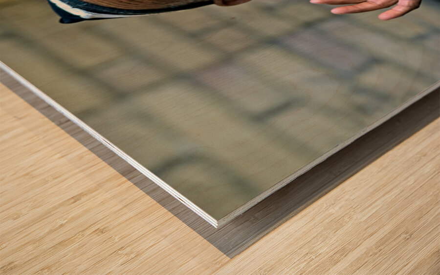 Elderly man showing hand gestures in Khiva Uzbekistan Wood print
