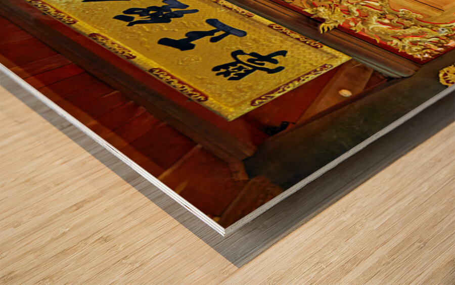 Statue and altar displayed in a temple in Hanoi Vietnam Wood print