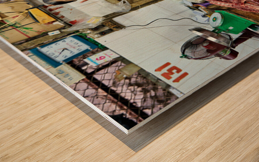 Market scene in Ho Chi Minh City with meat vendor Wood print
