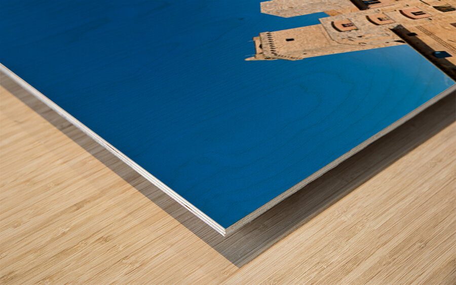 Visitors walk through Piazza della Cisterna in San Gimignano Wood print